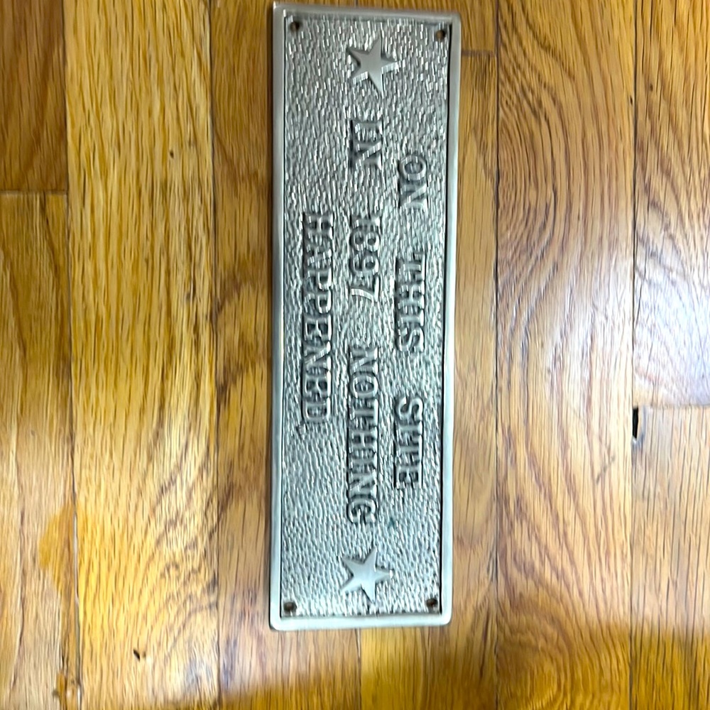Vintage Brass Wall Sign "On This Site In 1897 Nothing Happened" Plaque.